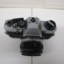 Load image into Gallery viewer, Olympus OM10 SLR camera with Olympus Zuiko Lens 50mm F1.8