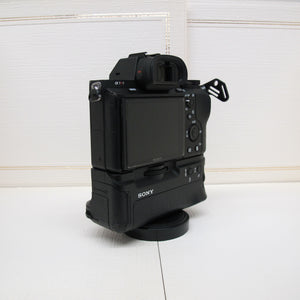 Sony Alpha 7R body and power pack.